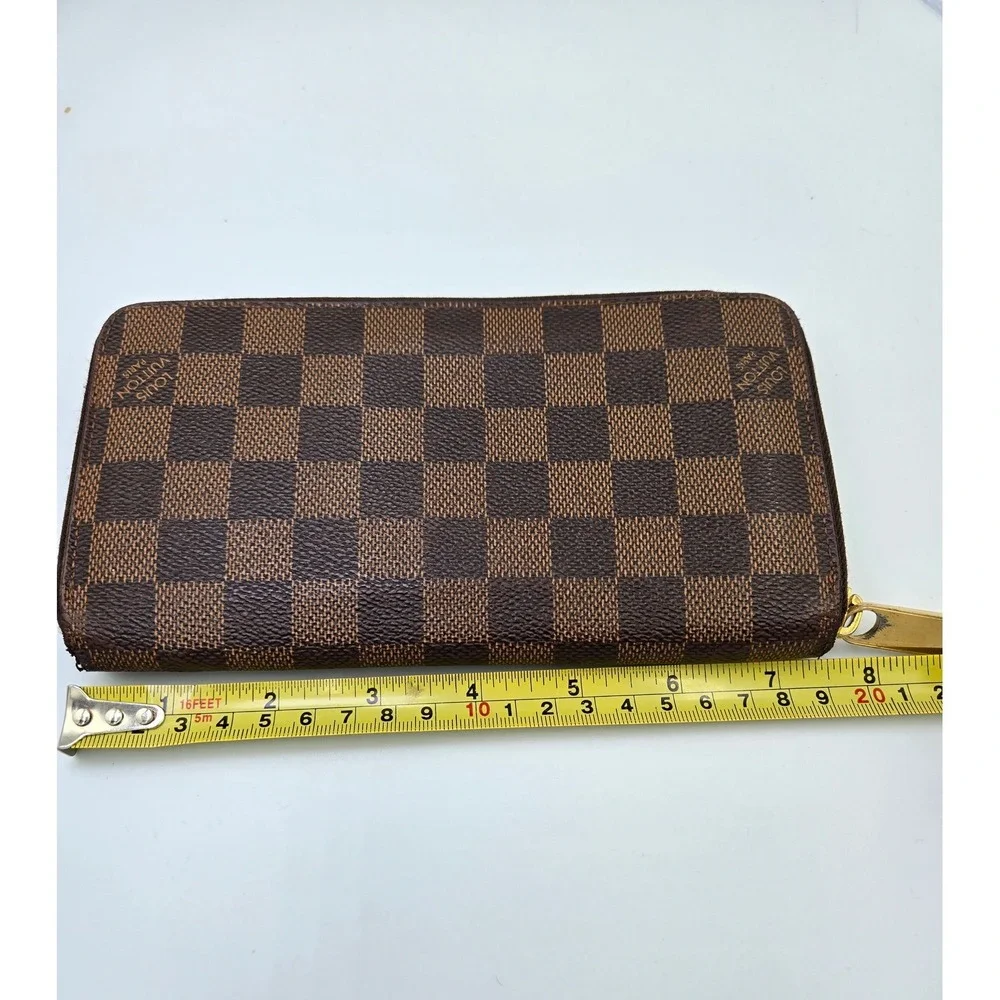Louis Vuitton Damier Ebene Zippy Wallet Brown Coated Canvas